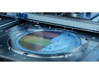 Semiconductor Wafer after Dicing Process. Silicon Dies are Being Extracted by Pick and Place Machine. Computer Chip Manufacturing. Packaging Process.